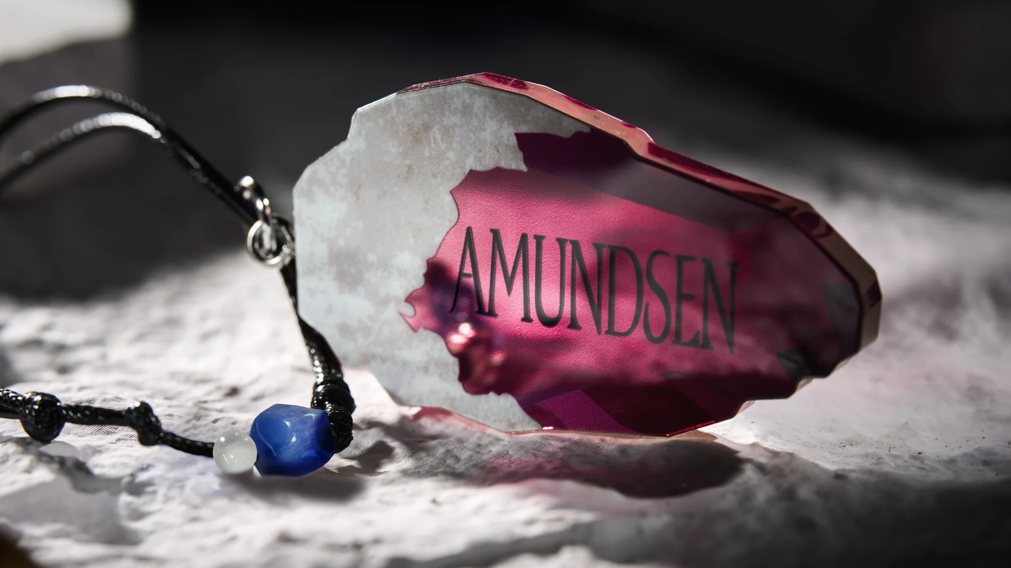 【BONUS】Reverse: 1999 "Reflection in the Cradle" Nautika Acrylic Pendant - Image 2